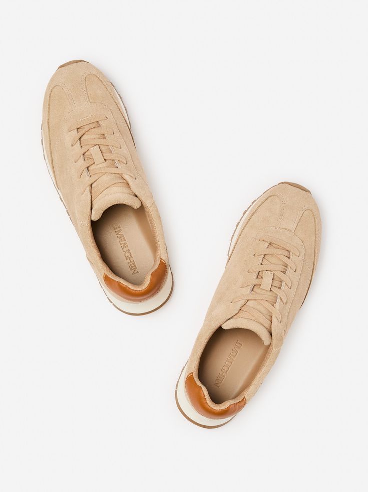 Refresh your sneaker rotation this fall with Agathe, a neutral goes-with-everything lace up style featuring a leather heel tab. | J.McLaughlin Women's Agathe Suede Sneakers Neutral, Size 10 | Leather/Suede Beige Suede Sneakers With Laces, Beige Sneakers With Cushioned Footbed For Everyday, Beige Everyday Sneakers With Cushioned Footbed, Beige Cushioned Sneakers For Everyday Use, Everyday Sneakers With White Sole And Laces, White Sole Sneakers With Laces, Beige Lace-up Sneakers With Gum Sole, Everyday Low-top Suede Sneakers, Everyday Lace-up Sneakers With Gum Sole