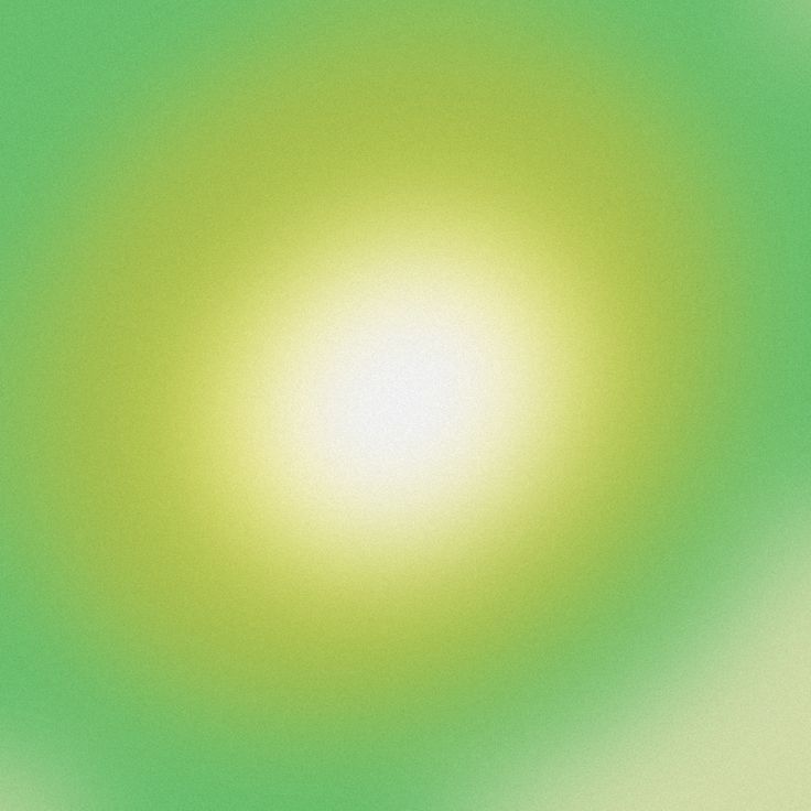 a blurry green and yellow background with white circles