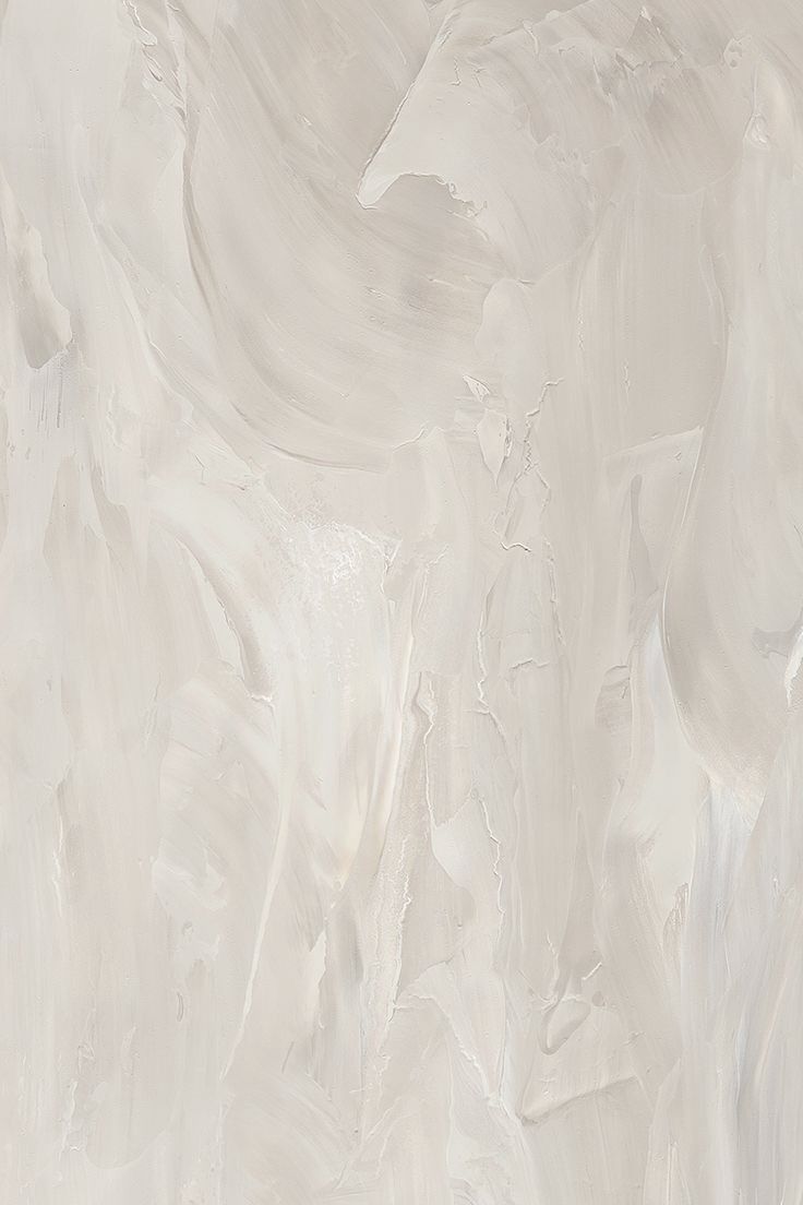 a white marble textured wallpaper with grey and beige paint streaks on the walls