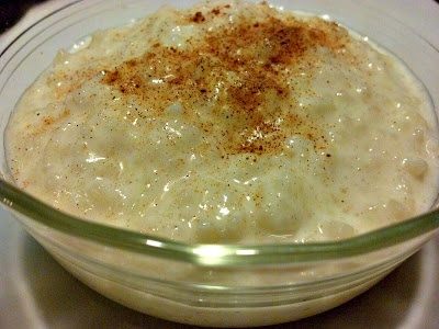 an oatmeal in a glass bowl with cinnamon on top