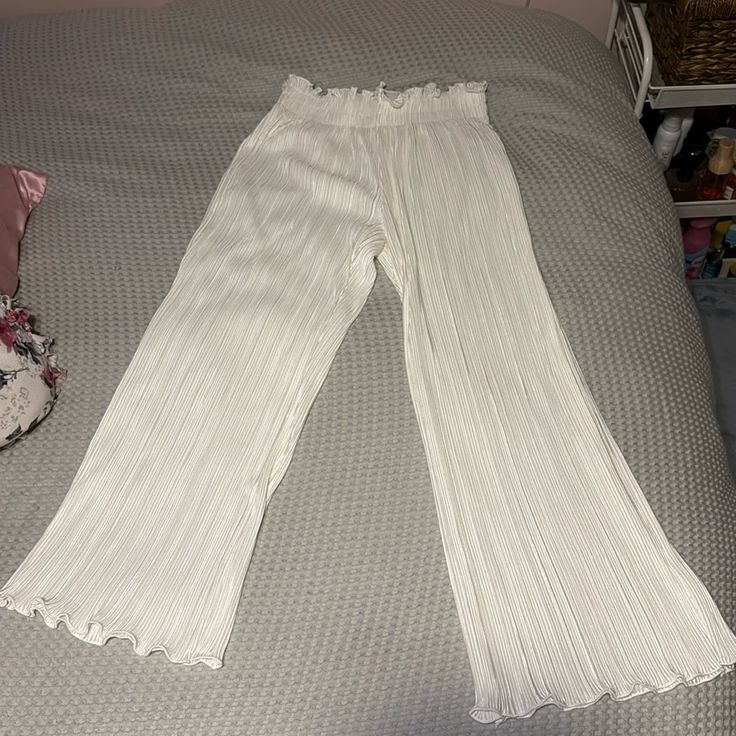 White Urban Outfitters Pants! Flared At The Bottom Size Medium Summer Stretch White Pants, Trendy Wide Leg White Bottoms, White Cargo Pants For Spring, Trendy White Wide Leg Bottoms, Fitted White Bottoms With Elastic Waistband, Trendy White Wide-leg Bottoms, White High-waisted Pants, Urban Outfitters High Waist Bottoms For Spring, Urban Outfitters High Waist Bottoms For Day Out