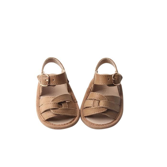 ***Looking for a larger size? Click HERE to see this same style with larger sizes in a hard sole.*** Our sandals are easy to dress up or down making them the best accessory. These cute sandals are just what your little one needs this summer! Genuine leather Leather lining Leather soft sole provides comfort and protection for young babies and early walkers Handy heel strap makes sliding tiny toes into these shoes a breeze! Cute Closed Toe Summer Slippers, Casual T-strap Sandals With Rubber Sole And Round Toe, Casual T-strap Sandals With Round Toe And Rubber Sole, Beach Slippers With Buckle Closure And Round Toe, Cute Summer Sandals With Rubber Sole, Brown Non-slip Synthetic Sandals, Vacation Slippers With Rubber Sole And Round Toe, Vacation Slippers With Round Toe And Rubber Sole, Spring Rubber Sole Round Toe Flip Flops