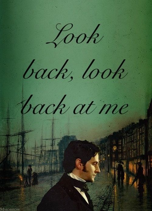 a man standing in front of a green background with the words look back, look back at me