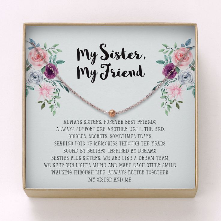 a necklace in a box that says, my sister, my friend