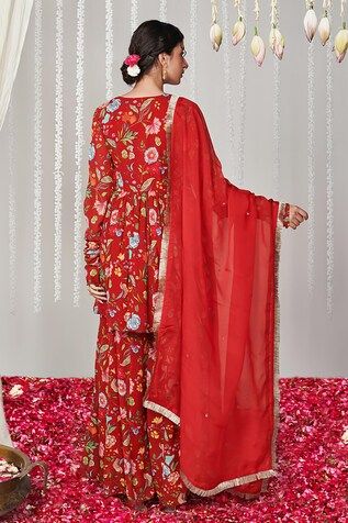 Red kurta with floral print and sequin embroidery details. Paired with a printed sharara and dupatta. - Aza Fashions Red Sharara With Floral Embroidery For Navratri, Bollywood Red Sharara With Floral Embroidery, Red Floral Embroidery Sharara For Navratri, Semi-stitched Red Sharara With Floral Embroidery, Red Semi-stitched Sharara With Floral Embroidery, Traditional Red Sharara With Floral Embroidery, Red Floral Embroidered Semi-stitched Sharara, Red Semi-stitched Anarkali Set With Floral Embroidery, Red Floral Embroidered Anarkali Set For Eid