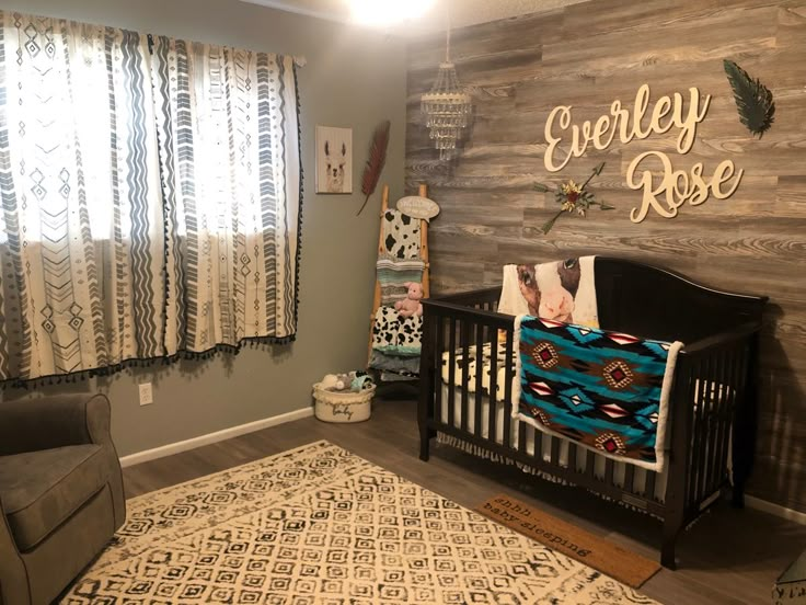 Wood accent wall. Western baby girl nursery. Corner chandelier. Blanket Ladder. Daughter Nursery Ideas, Western Nursery Ideas Farmhouse, Country Baby Nursery Ideas, Nursery Ideas Western Theme, Western Theme Nursery Girl, Baby Girl Nursery Western Theme, Baby Girl Country Nursery, Country Girl Nursery Ideas, Rustic Baby Room Ideas