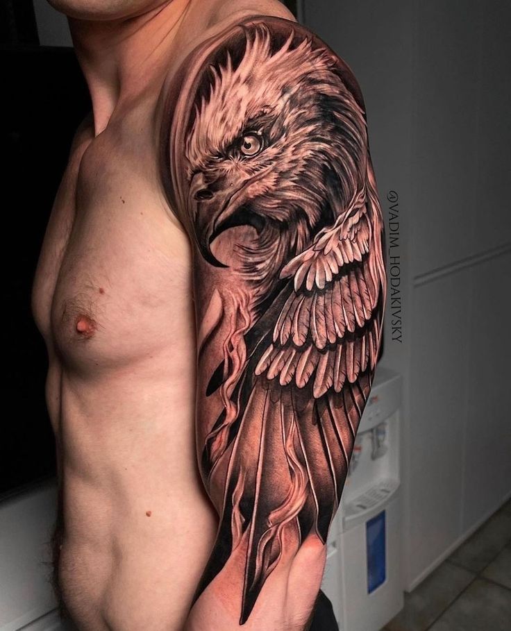 a man with an eagle tattoo on his arm