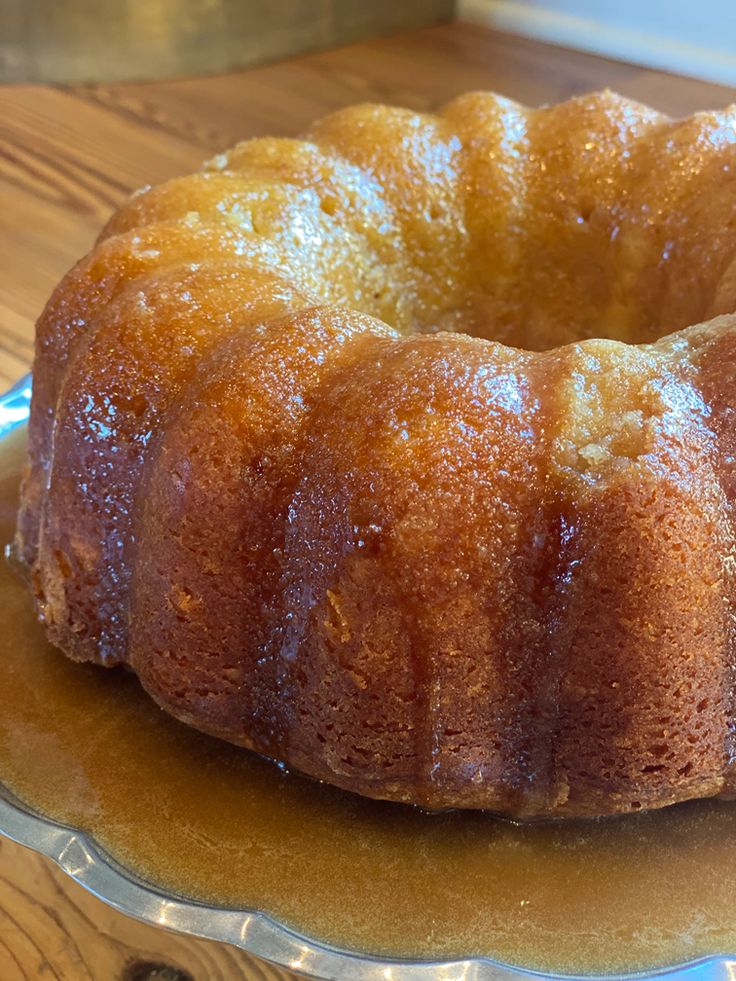 a bundt cake sitting on top of a glass plate