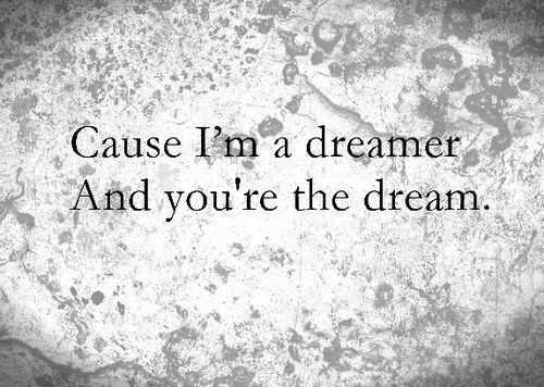 a black and white photo with the words cause i'm a dreamer and you're the dream