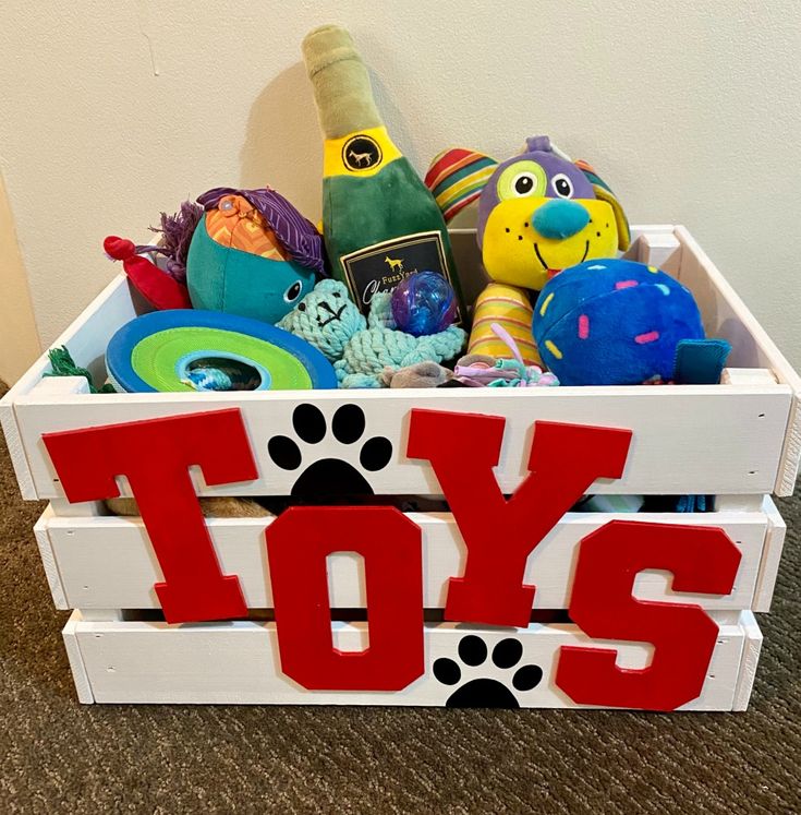 a toy box filled with toys and stuffed animals