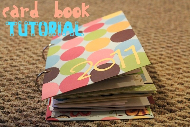 a stack of colorful notebooks sitting on top of a carpeted floor with the title, card book tutorial 2011