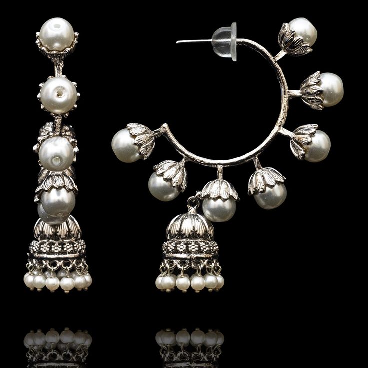 Adorn your ears with timeless splendor – wear your heritage and embrace your style! A lovely pair of earrings that are a perfect fusion of tradition and modernity displayed in a masterful and detailed carving with unique design. Approximate earrings length is 3". Please click on the video for a detailed view of the product. Designed over brass with silver oxidized finish. In-stock & ready-to-ship. *Please Note: We use faux stones and beads in all of our jewelry. Unique Gift Cards, Create Words, Oxidized Silver, Faux Stone, Free Giveaway, Beautiful Jewelry, Unique Designs, Unique Gifts, Brass