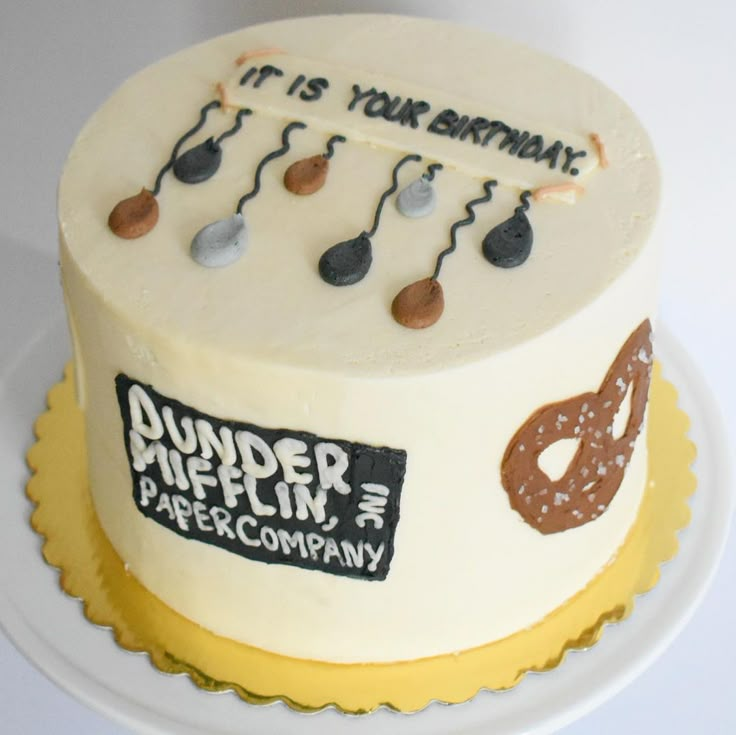 a birthday cake decorated with music notes and musical instruments on it's icing