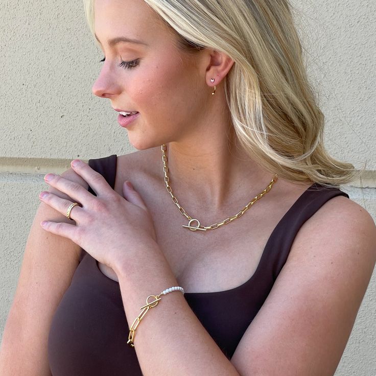 The Chain and Pearl Bracelet is half classic pearls, half modern chain — what more could you ask for? Stack this timeless bracelet with other gold bracelets, or for a full pearl look pair it with our pearl earrings and necklace. Want more pearl jewelry? Shop our Pearl Capsule. Classic Pearl Bracelet With Adjustable Chain For Everyday, Modern Gold Pearl Bracelet, Elegant Everyday Pearl Necklace With Chain, Modern Pearl Jewelry With Adjustable Chain, Everyday Metal Jewelry With Pearl Drop, Everyday Metal Pearl Drop Jewelry, Modern Gold Pearl Bracelets, Modern Gold Plated Jewelry With Pearl Charm, Elegant Chain Bracelet With Toggle Clasp For Everyday