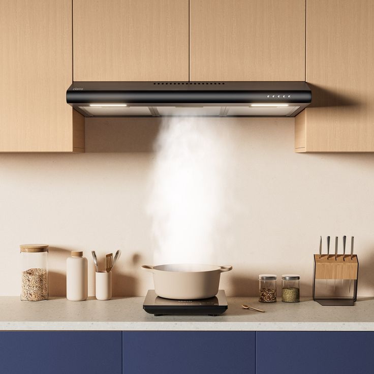 a kitchen stove with steam coming out of it