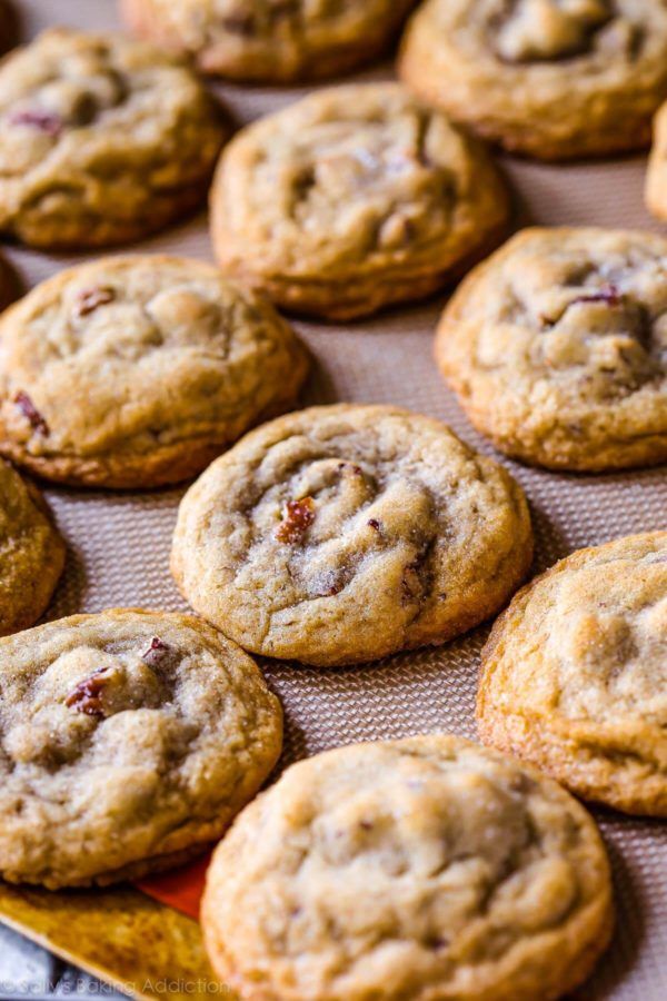 freshly baked chocolate chip cookies on a baking sheet