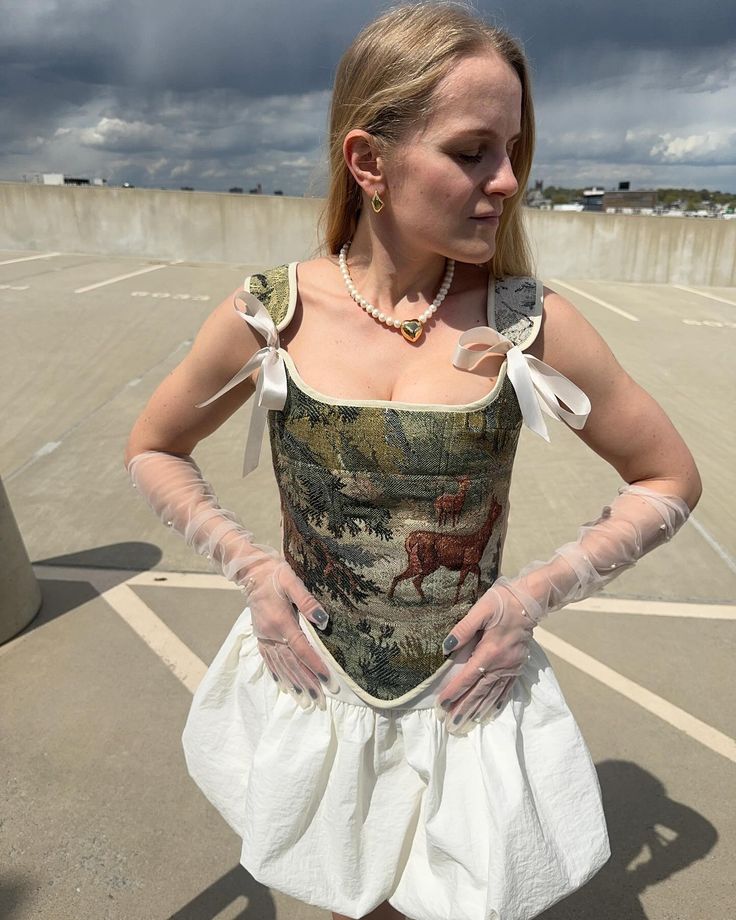 Yesss, corset and elbow-length gloves are such a dreamy combo! 🤍 Rocking a short balloon skirt with my handmade corset with matching ribbons that I absolutely adore! And can we talk about these elbow-length gloves with pearl embellishments? 🤩 They’re the perfect finishing touch! What’s the most fabulous outfit you’ve ever put together that made you feel amazing? Share in the comments! 💬👇🏻 #OOTD #HandmadeFashion #styleinspo #springoutfit Mini Length Corset With Boning, Elegant Mini Corset Dress With Lace Patchwork, Luxury Mini Corset Dress With Boning, Corset Skirt Outfit, Party Mini Corset Dress With Built-in Bra, Patch Work Corset, Elbow Length Gloves, Balloon Skirt, Corset Outfit