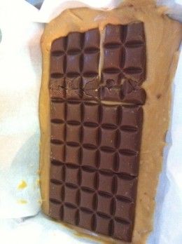 there is a chocolate bar that has been cut in half