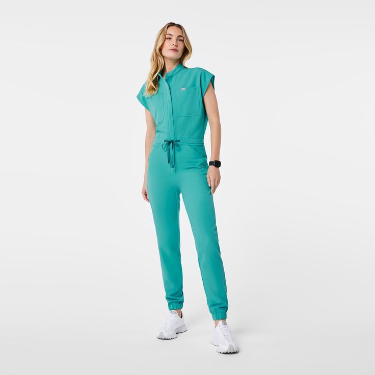 Official FIGS® Scrubs. Ridiculously Soft Scrubs Designed Just For You. Get Free Shipping On Orders $50+! | FIGS Womens Oasis Rafaela - Cargo ScrubJumpsuit™ Women’s Scrubs, Scrub Jumpsuit, Figs Scrubs, Lab Coats, Nursing Shoes, Awareness Ribbon, Top Graphic Tees, Awareness Ribbons, Oversized Top