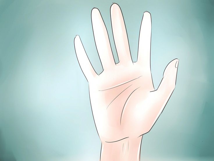 a person's hand reaching up towards the sky with their left hand extended out