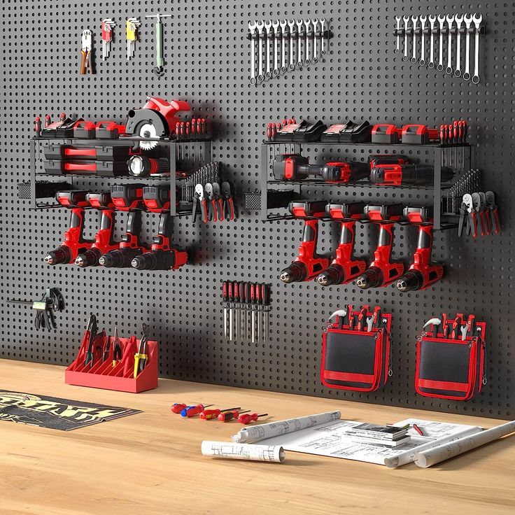 a workbench with tools hanging on the wall and pegs attached to it