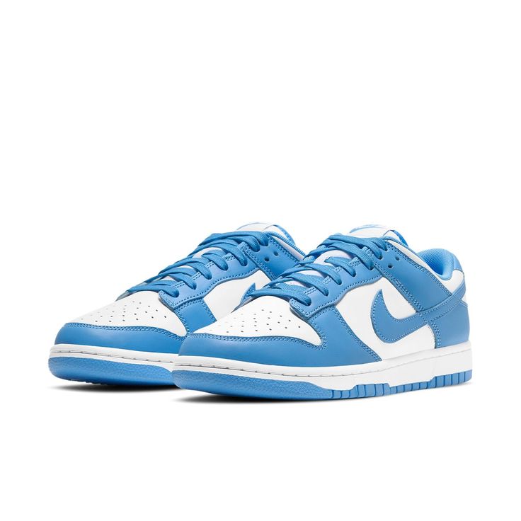 Nike Dunk Low "University Blue"’s shade marks the overlays as what everyone expected, turning the Swoosh, toe, and heel into firm Tar Heels supporters. Below, the foundation is dressed in white neutral, maintaining the classic two-toned aesthetic. The branding on the other hand, while complements in tone, switch things up a bit as their embroideries are subtly degraded. SKU: DD1391-102 Release Date: Jun 24, 2021 Color: White/University Blue/White Modern Blue Custom Sneakers For Streetwear, Blue Fade-resistant Sneakers For Streetwear, Fade-resistant Blue Sneakers For Streetwear, Blue High-top Custom Sneakers With Fade-resistant, Campus Adidas, Unc University, Jordan 9 Retro, All Nike Shoes, Jordan 11 Retro Low