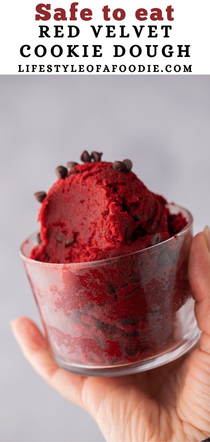 red velvet cookie dough in a glass bowl with text overlay that reads safe to eat red velvet cookie dough