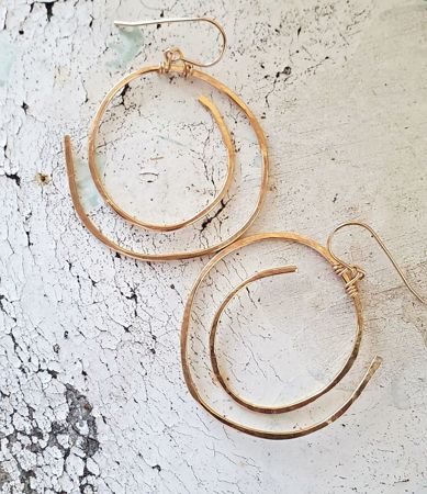 Light weight gold spiral statement earrings Elegant Spiral Hoop Earrings For Gift, Elegant Spiral Hoop Earrings As Gift, Elegant Spiral Wire Wrapped Hoop Earrings, Spiral Earrings With A Modern Twist, Modern Twist Round Earrings, Handmade Swirl Jewelry With A Modern Twist, Modern Twist Nickel-free Drop Earrings, Handmade Spiral Earrings For Everyday Wear, Gold Swirl Metal Earrings