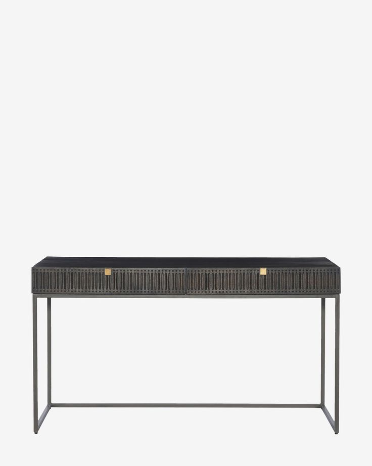 an iron and wicker console table with two brass knobs on each side, against a white background