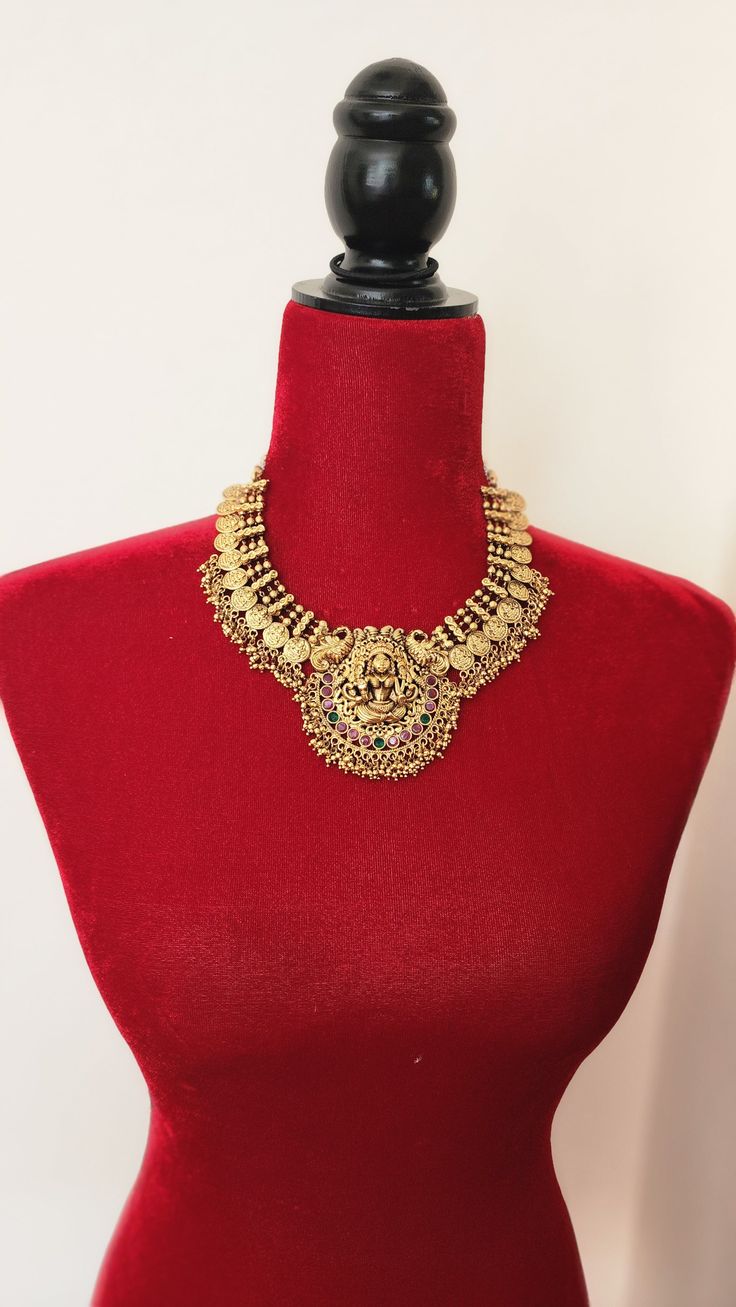 Add charm and charisma to your beautiful personality with these beautifully designed and handcrafted Brass necklaces. The antique finish gives this Necklace a very eye-catching look. Long necklace designed beautifully and compliments very well. Wear it with any of your party or casual outfits and grab compliments all the way! Gold Kundan Necklace With Peacock Design For Celebration, Heavy Gold Bollywood Necklaces, Gold Kundan Chandbali Necklace, Gold Heavy Bollywood Necklace, Heavy Gold Bollywood Necklace, Gold Necklace With Peacock Design For Navratri, Gold Peacock Design Necklace, Gold Brass Jewelry With Peacock Design, Gold Chandbali Necklaces With Peacock Design