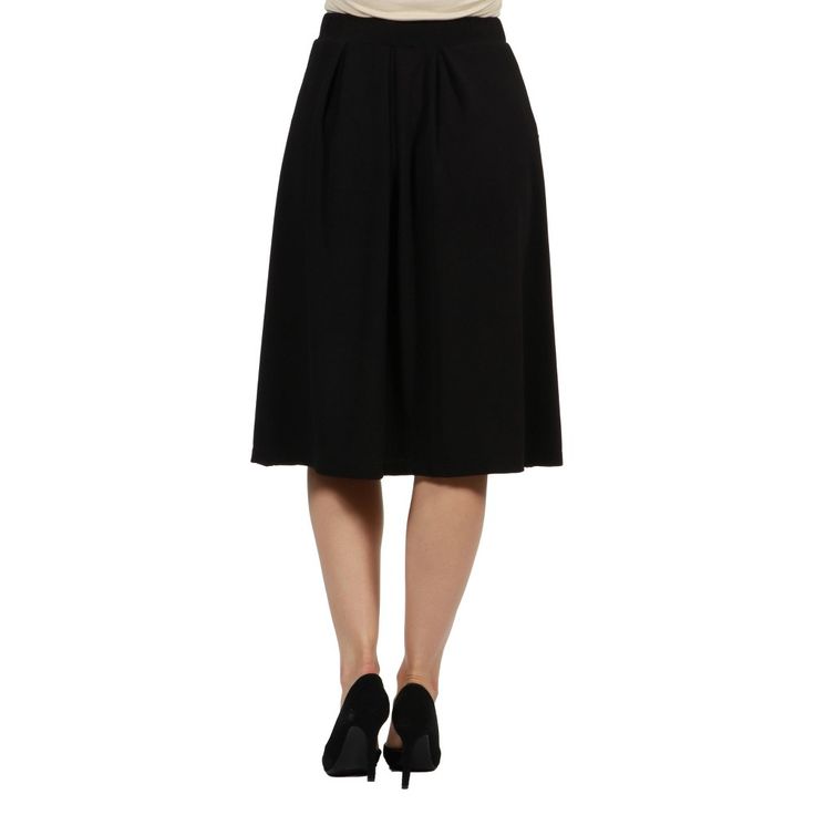 A classic black skirt is a wardrobe must have! This knee length skirt features an elastic waist, knee length, pockets, pleating, and a comfortable fit.