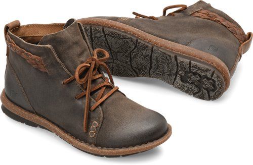 A vintage-inspired walking boot ornamented with a natural braided strap. Rugged Lace-up Boots With Stitched Sole For Fall, Casual Lace-up Hiking Boots With Leather Sole, Casual Brown Ankle-high Lace-up Boots, Casual High-top Boots For Adventure, Casual Oiled Leather Lace-up Boots For Outdoor, Rustic Leather Hiking Boots, Casual Ankle Lace-up Boots For Hiking, Casual Brown Lace-up Boots For Fall, Casual Leather Lace-up Hiking Boots