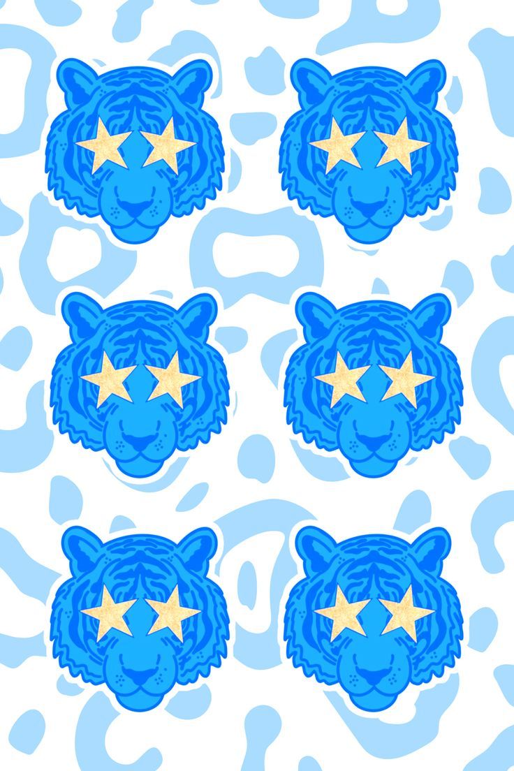 blue and yellow tiger heads with stars on them