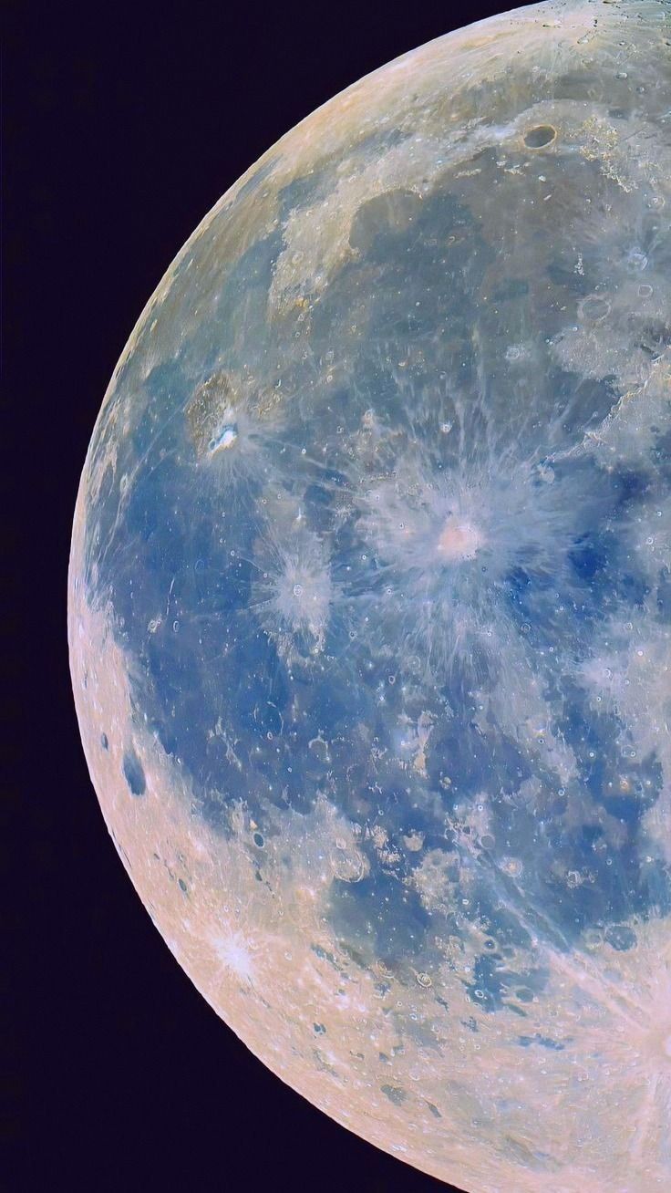 an airplane flying in front of the moon