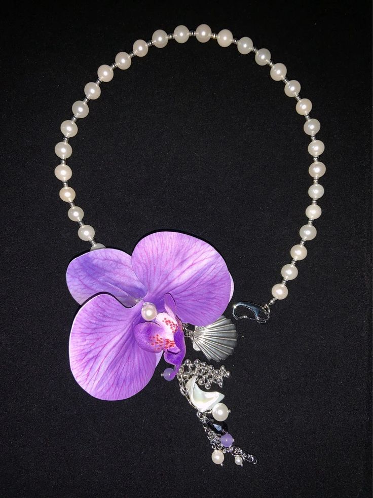 Butterfly Orchid Tassel Necklace | Jewelry | Three Fleas Trendy Handmade Flower Necklace For Gift, Trendy Beaded Necklaces For Gift, Trendy Beaded Necklace For Gifts, Trendy Purple Necklace For Gift, Handmade Long Trendy Necklace, Trendy Pearl Choker Necklace As Gift, Unique Pendant Jewelry For Party, Handmade Lariat Choker As Gift, Trendy Purple Necklace For Gifts