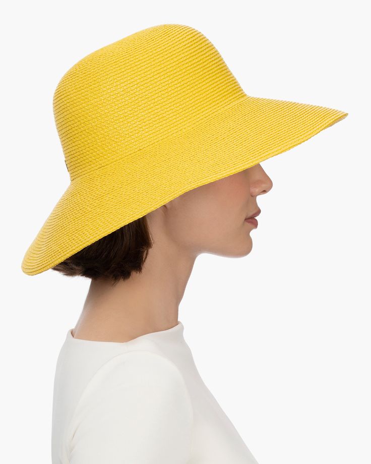 A versatile women's skimmer of our patented Squishee® packable straw. Eric's desire to create a simple, timeless sun hat that would transcend ever-changing trends resulted in this design. The Hampton is available in a range of numerous neutrals as well as a selection of delicious colors. This iconic women's Hampton rollable hat for sale online looks good on everyone and offers advanced sun protection, durability and packability. You will want to take it with you wherever you go this summer! The Small Leather Accessories, Gold Sand, Art Costume, Navy Linen, Women's Headwear, Costume Institute, Natural Gold, Enjoying The Sun, Iconic Women