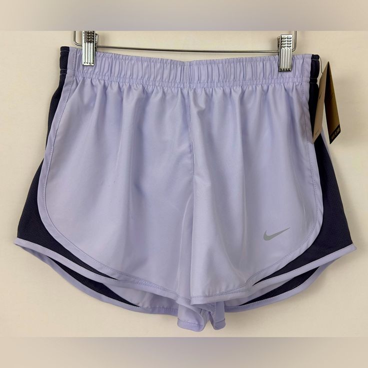 Nike Dri-Fit Training Shorts Size Medium Color - Light Lilac & Dark Gray Mesh Sides ! The Nike Tempo Shorts Deliver Sweat-Wicking Technology And A Trimmed-Up Design For A Classic Fit. This Product Is Made With At Least 75% Recycled Polyester Fibers. New With Tags! Benefits Dri-Fit Technology Helps You Stay Dry And Comfortable. Mesh Side Insets Ventilate To Keep You Cool. Elastic Waistband With An Internal Drawcord Personalizes The Fit. Internal Drop-In Pocket On The Back Right Provides A Place F Womens Basketball Shorts, Black Nike Pros, Nike Shorts Women, Nike Set, Nike Tempo Shorts, Black Nike Shorts, Nike Sportswear Women, Nike Tempo, Light Lilac