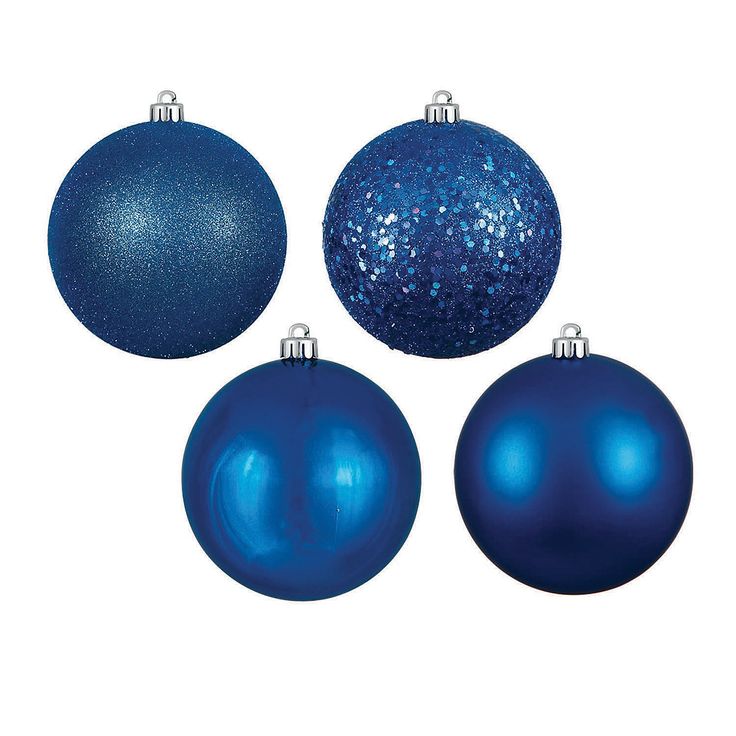 three shiny blue christmas ornaments on a white background