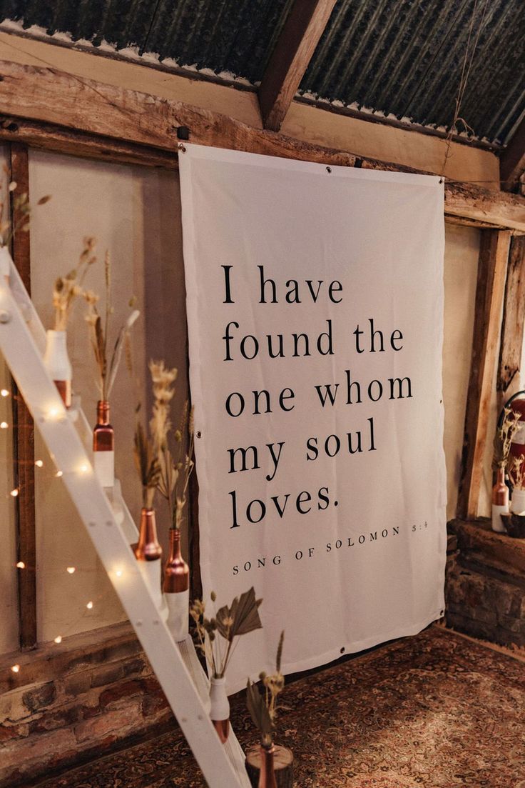 a white banner that reads i have found the one whom my soul loves on it