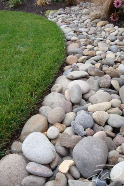 there is a rock garden bed in the yard