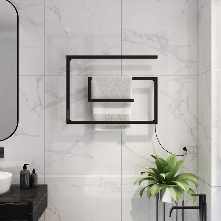 a modern bathroom with marble walls and flooring