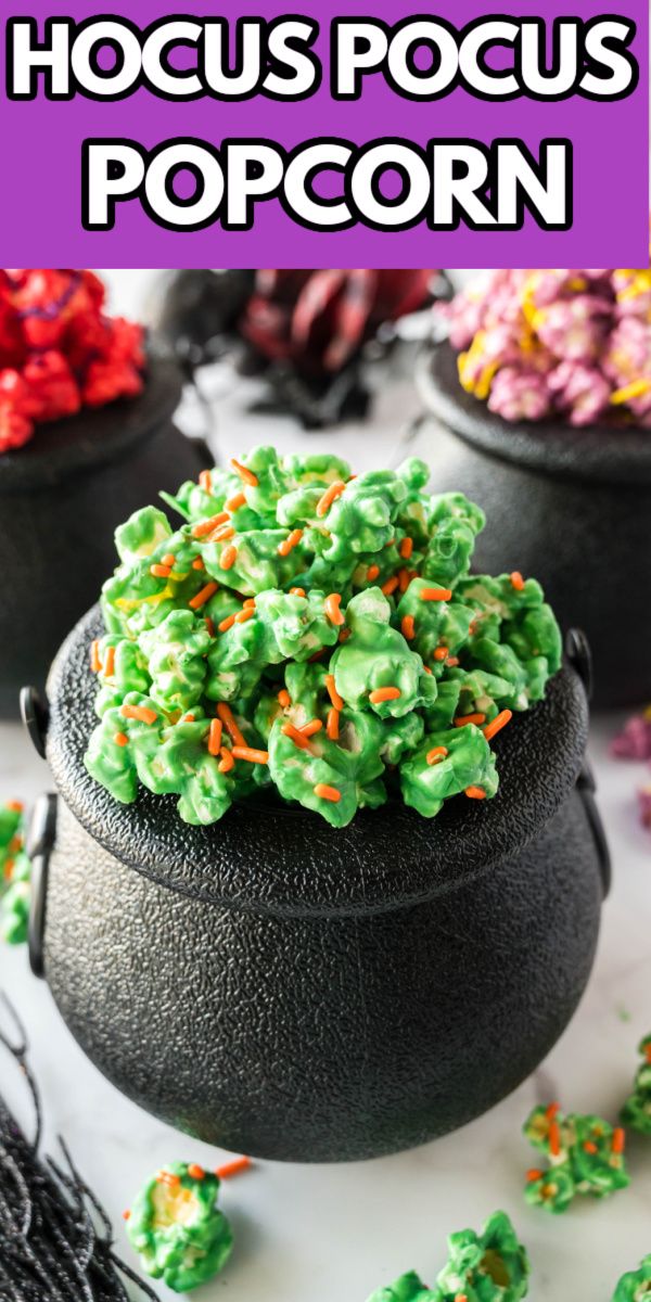 a pot full of green and orange sprinkles with the words hoccus pocus popcorn