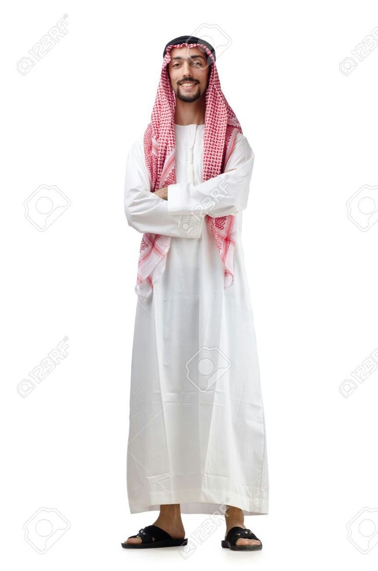 an arab man standing with his arms crossed and looking at the camera on white background stock photo