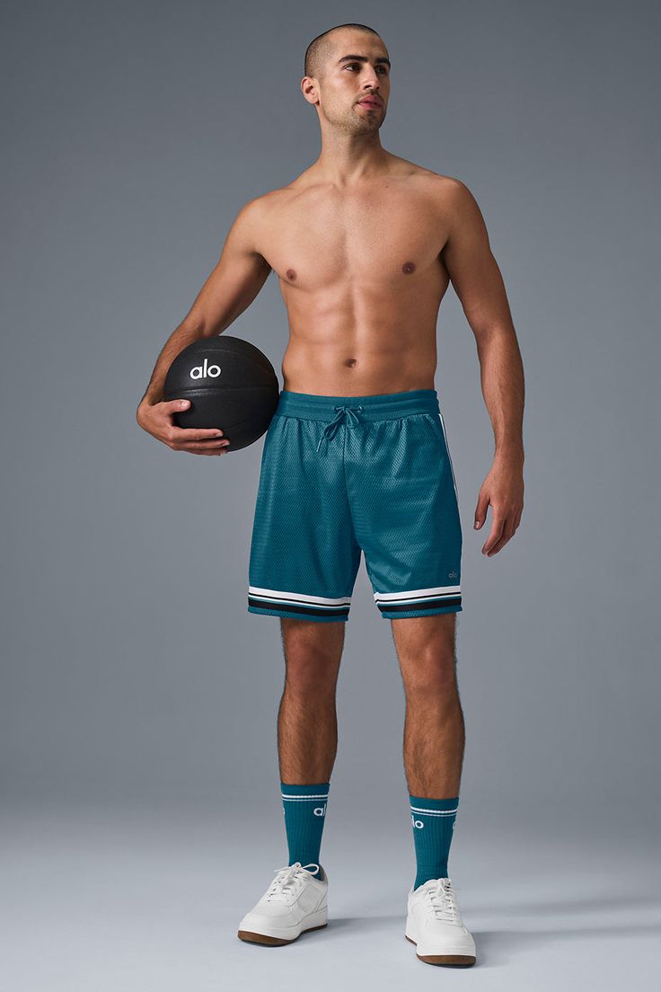 Basketball shorts are always a good idea—especially when they��’re this functional and fresh. This pair is designed with a drawstring waist, a relaxed fit, zippered side pockets, and cool contrasting trim. The unlined design is extra versatile, so you can pick the right base layer for every activity, but it’s the drapey, stretchy, seriously breathable fabric that scores bonus points on- and off-the-court. Workout Clothes For Men, Gray Accessories, Red Shop, Sweatpants Shorts, Yoga Training, Basketball Shorts, Fabric Sale, Kendall + Kylie, Short Shirts