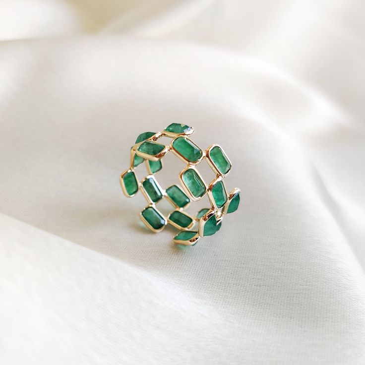 This stunning ring is set in 14K Solid Yellow Gold with Natural Emerald. It is an unique & dainty gemstone ring for nearly every occasion and is completely hassle-free jewelry. 🔷ABOUT GEMSTONE:  Emerald is often associated with love and romantic relationships. It is believed to promote love, loyalty, and unity, making it a popular choice for engagement and anniversary jewelry. Emerald is often associated with abundance and financial success. It is believed to attract prosperity and opportunitie Nails With Emerald Ring, Green Gem Ring, Luxury Green Crystal Ring In Open Ring Style, Rings Dainty, Luxury Green Crystal Ring With Gemstone, Green Crystal Open Ring In 14k Gold, Emerald Baguette Ring, Green Emerald Fusion Ring, Green Emerald Fusion Style Ring