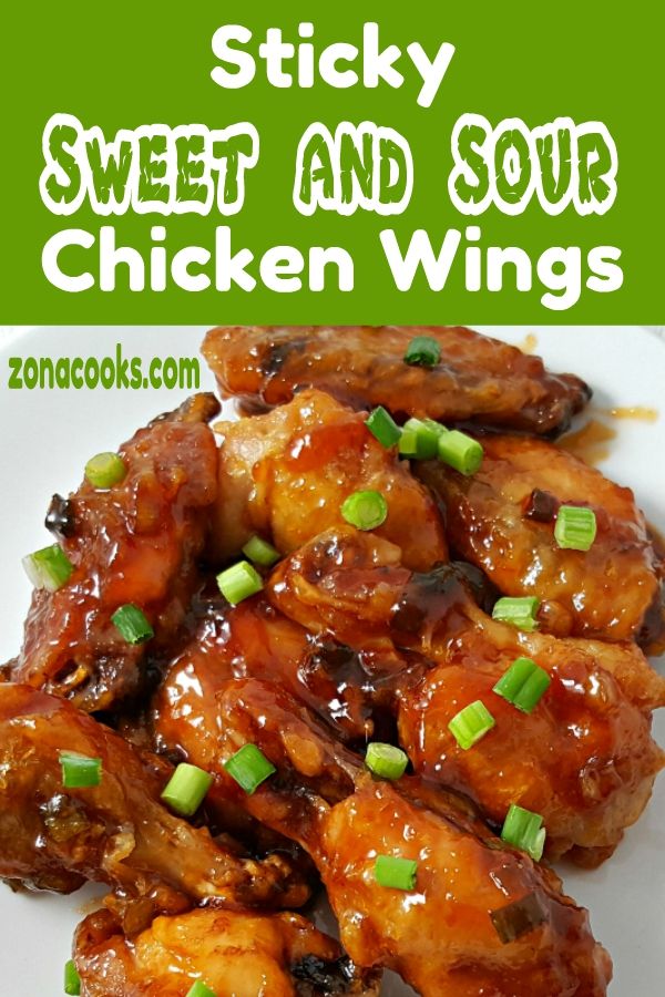 sticky sweet and sour chicken wings on a plate