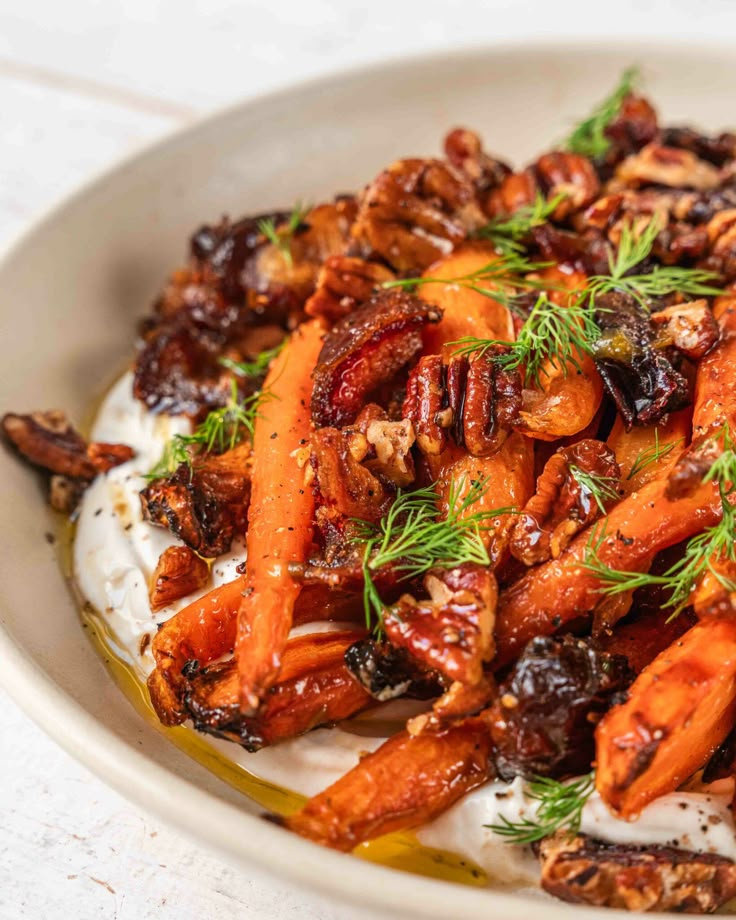 carrots and nuts with yogurt in a bowl