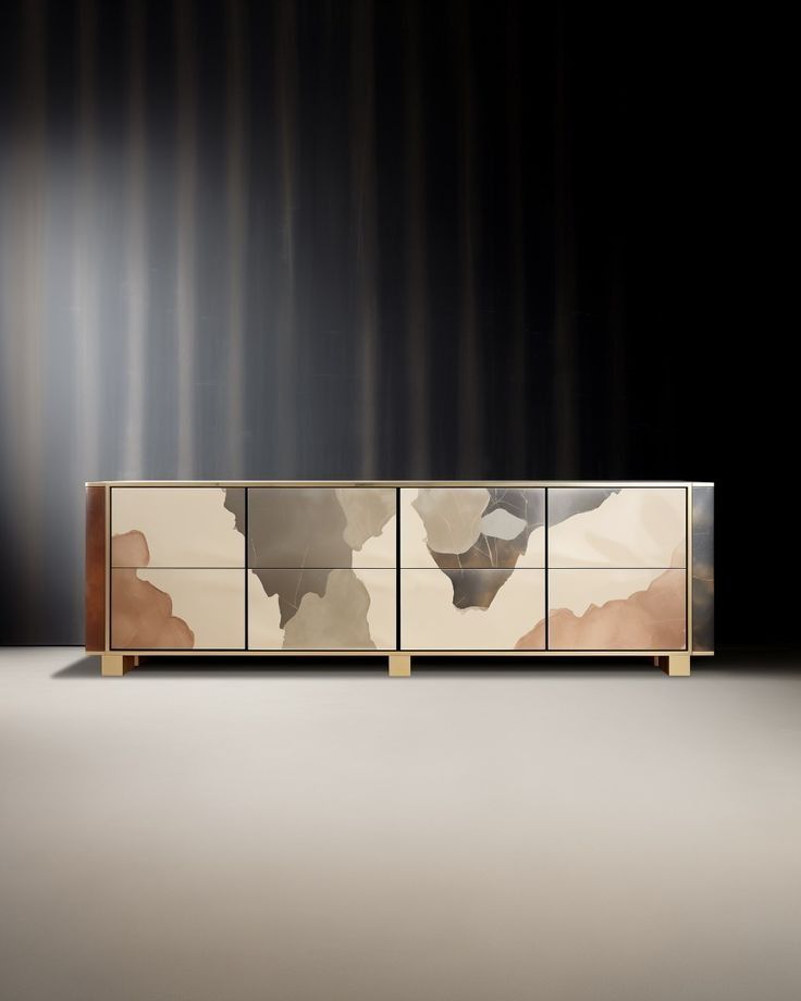 the sideboard is designed to look like it has an abstract camouflage pattern on it