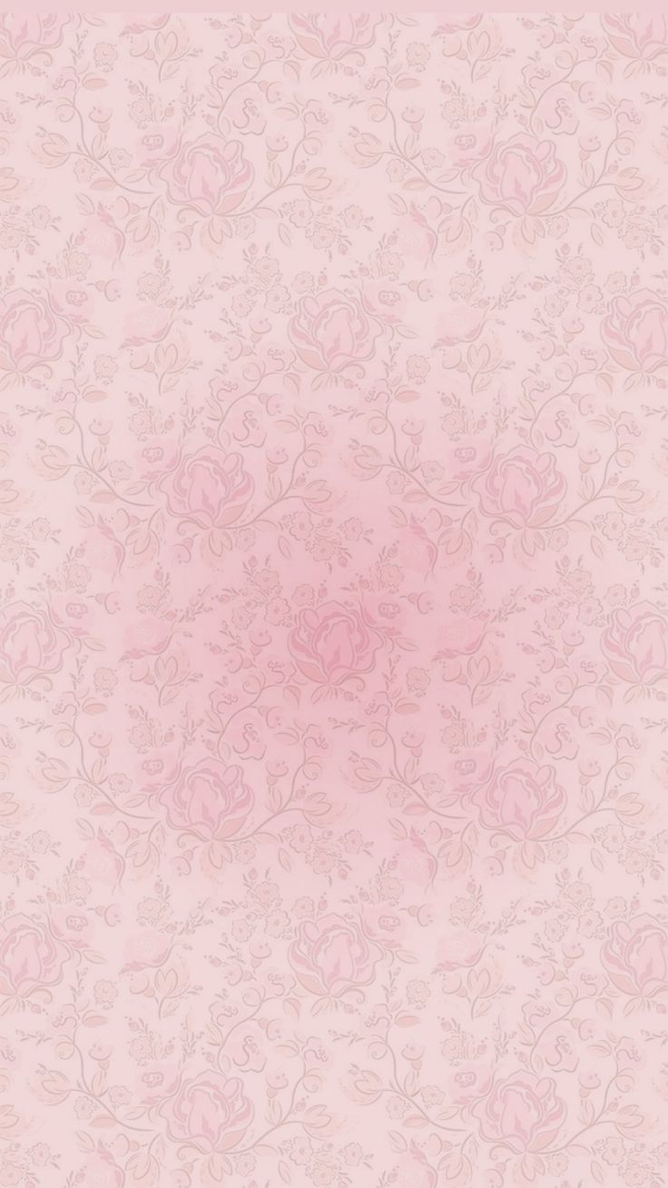 a pink wallpaper with flowers on it