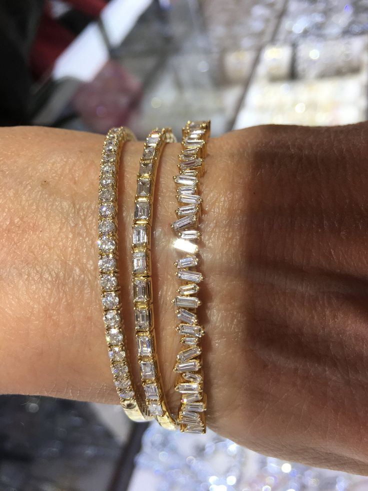 Choose from 14K yellow, white, or rose gold bangles. All priced from 3,500 - 4.800 depending on diamond weight. Stackable Baguette Cut Diamond Jewelry, 14k Gold Bangle With Vvs Clarity, Luxury Gold Stackable Bracelet With Cubic Zirconia, Luxury Gold Cubic Zirconia Stackable Bracelet, Luxury Stackable Gold Bracelet With Cubic Zirconia, Luxury Cubic Zirconia Gold Stackable Bracelet, Gold Bangle With Baguette Diamonds, Elegant Diamond White Stackable Bracelets, Luxury Diamond White Stackable Jewelry